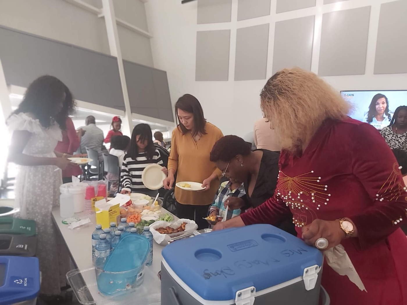 Diverse group enjoying fellowship meal together
